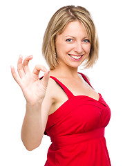 Image showing Woman is showing OK sign