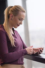 Image showing business woman using smart phone at office