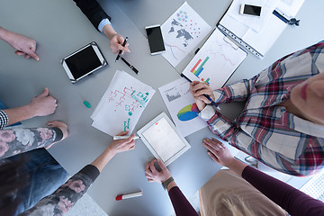 Image showing top  view of business people group brainstorming on meeting