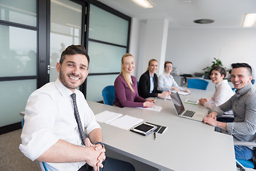 Image showing young business people group on team meeting at modern office