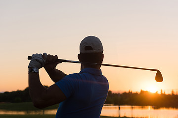 Image showing golfer hitting long shot