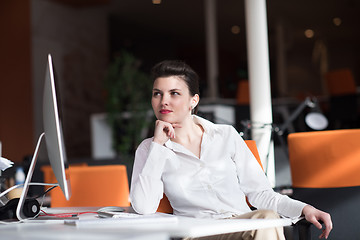 Image showing happy young business woman relaxing and geting insiration