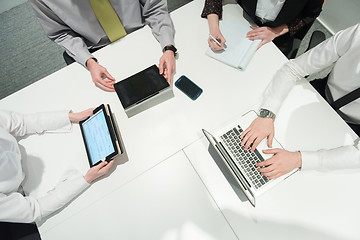 Image showing aerial view of business people group brainstorming on meeting