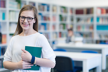 Image showing portrait of female student in library