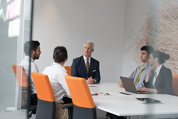 Image showing business people group brainstorming on meeting