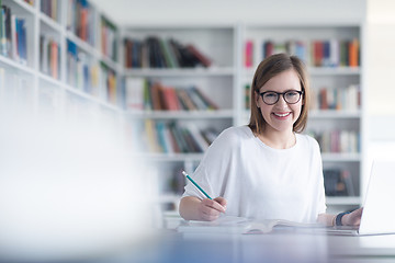 Image showing female student study in school library