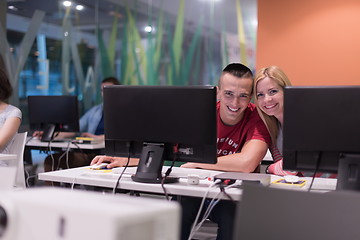 Image showing technology students group working in computer lab school  classr