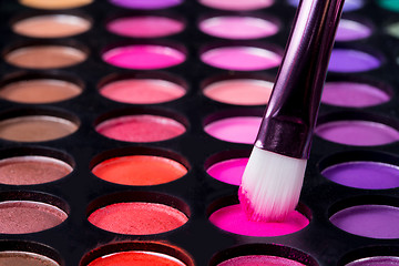 Image showing Makeup brushes and make-up eye shadows