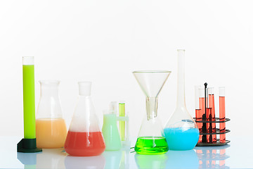 Image showing Test-tubes with liquid on light background