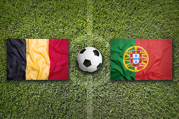 Image showing Belgium vs. Portugal flags on soccer field