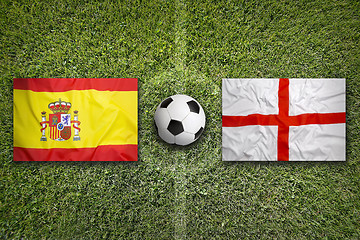Image showing Spain vs. England flags on soccer field