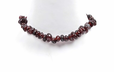 Image showing Splintered garnet chain on bust