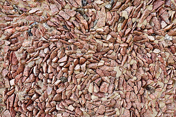 Image showing Wall of brown granite gravel