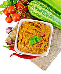 Image showing Caviar squash in clay bowl on top