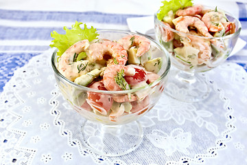 Image showing Salad with shrimp and tomatoes in glass on napkin silicone