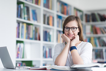 Image showing female student study in school library