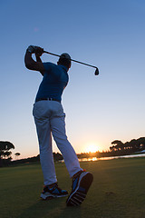 Image showing golfer hitting long shot