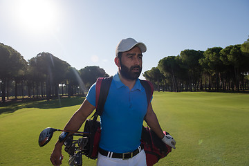 Image showing golf player walking