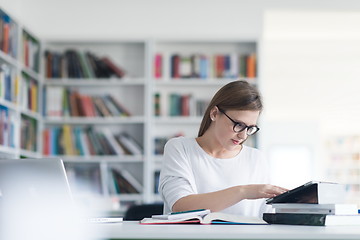 Image showing female student study in school library