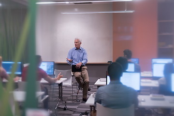 Image showing teacher and students in computer lab classroom