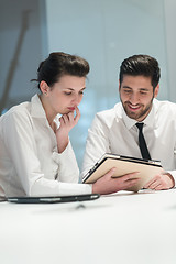 Image showing young business couple working together on project