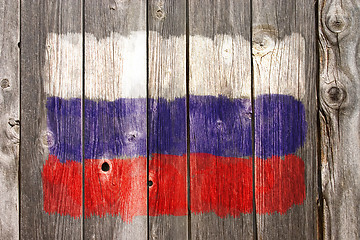 Image showing russian colors on old wooden wound