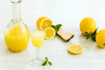 Image showing Italian traditional liqueur limoncello with lemon