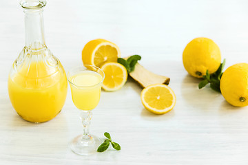 Image showing Italian traditional liqueur limoncello with lemon