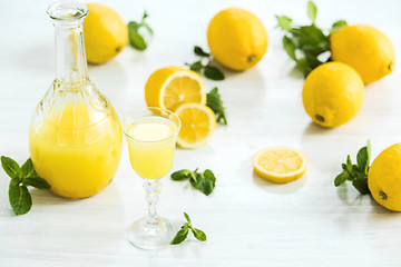 Image showing Italian traditional liqueur limoncello with lemon