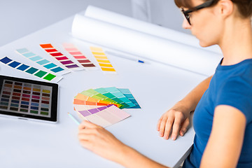 Image showing woman working with color samples for selection