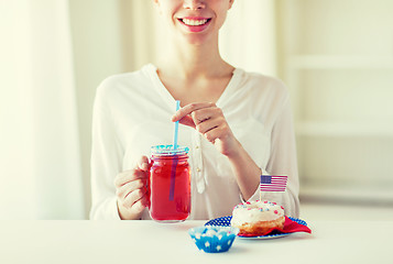 Image showing happy woman celebrating american independence day