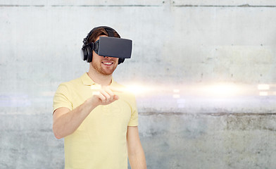 Image showing happy man in virtual reality headset or 3d glasses