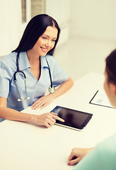 Image showing female doctor or nurse with tablet pc computer