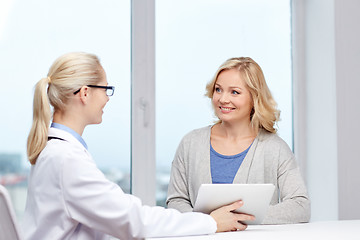 Image showing doctor with tablet pc and woman at hospital