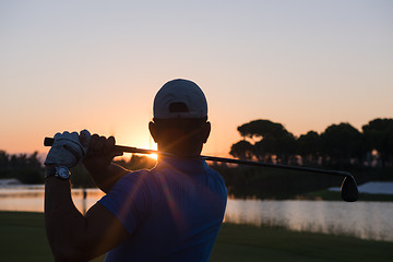 Image showing golfer hitting long shot