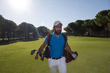 Image showing golf player walking