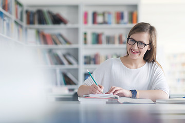 Image showing female student study in school library