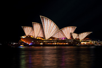 Image showing Sydney Opera House in warm coppery tones - Vivid Sydney 2016