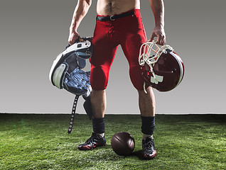 Image showing The american football player with ball