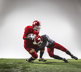 Image showing The two american football players in action