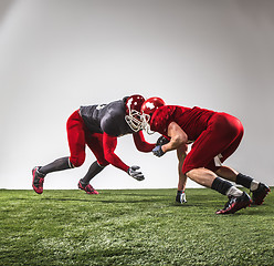 Image showing The two american football players in action