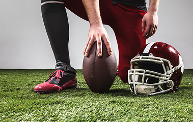 Image showing The american football player with ball