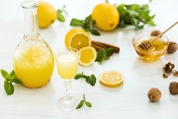 Image showing Italian traditional liqueur limoncello with lemon