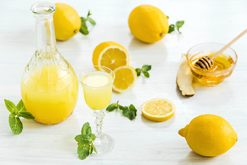 Image showing Italian traditional liqueur limoncello with lemon