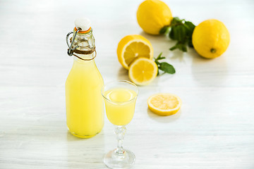 Image showing Italian traditional liqueur limoncello with lemon