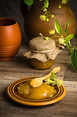 Image showing Saucer with lime honey on the table,\rclose-up