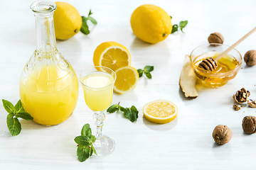 Image showing Italian traditional liqueur limoncello with lemon