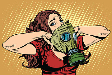 Image showing Civil defence girl wears a protective gas mask