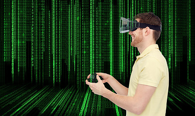 Image showing happy man in virtual reality headset with gamepad