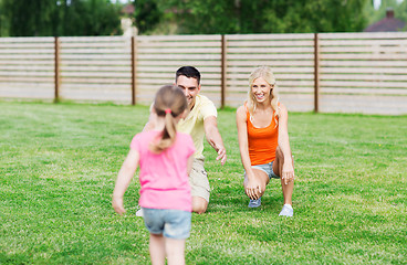 Image showing happy family playing outdoors